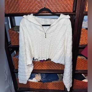 White cable knit quarter-zip sweater